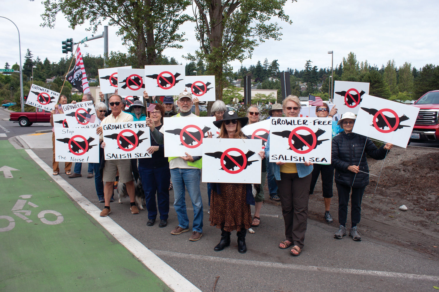 Nearly two dozen protesters of the proposed Growler operation expansion at Whidbey Island turned out to protest in Port Townsend July 13.